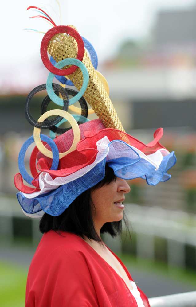 ASCOT, UNITED KINGDOM - JUNE 21: Racegoers attend day three of Royal Ascot at Ascot Racecourse on June 21, 2012 in Ascot, England. (Photo by Eamonn McCormack/Getty Images)