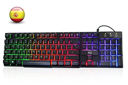 Rii RK100+ Novedoso Teclado USB Retroiluminado,Colores Rainbow y Panel metálico Resistente,Alta sensibilidad Ideal para Jugar, QWERTY con Layout Español Teclado espandido.