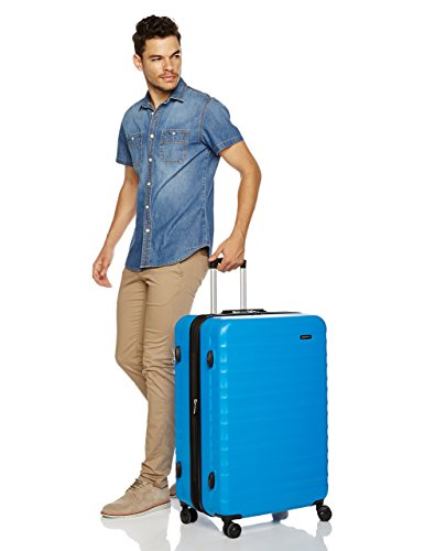 AmazonBasics - Maleta de viaje rígidaa giratoria - 78 cm, grande, Azul claro