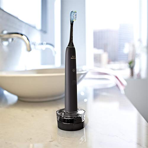 Philips Pack doble cepillos eléctricos DiamondClean 9000 en NEGRO, Cepillos conectados con app y tecnología sónica con 4 modos de cepillado, cabezales antiplaca C3, vaso cargador y base de carga