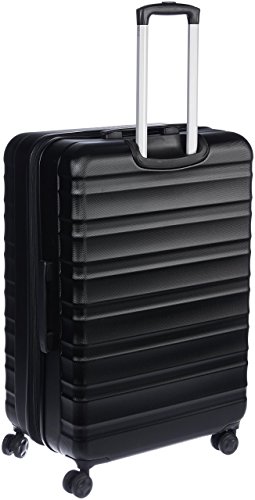 Amazon Basics - Maleta de viaje rígidaa giratoria - 78 cm, grande, Negro