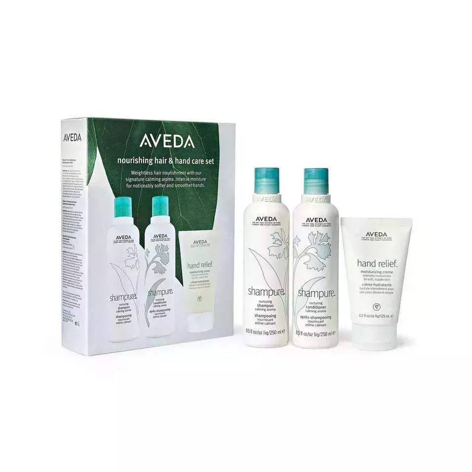 Aveda Shampure Shampoo & Conditioner Set on white background