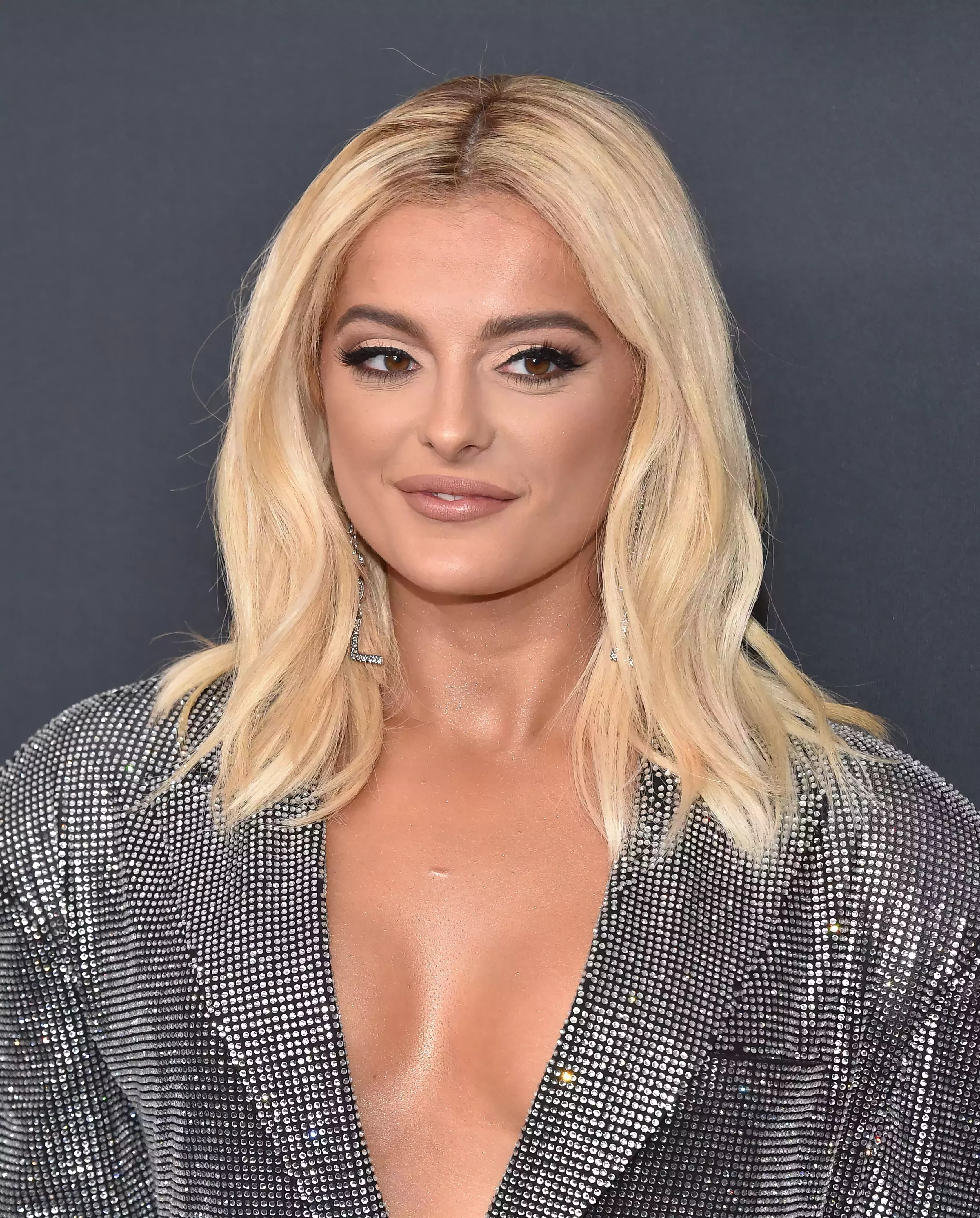 Bebe Rexha’s Rooted Platinum and Butter Blonde Balayage