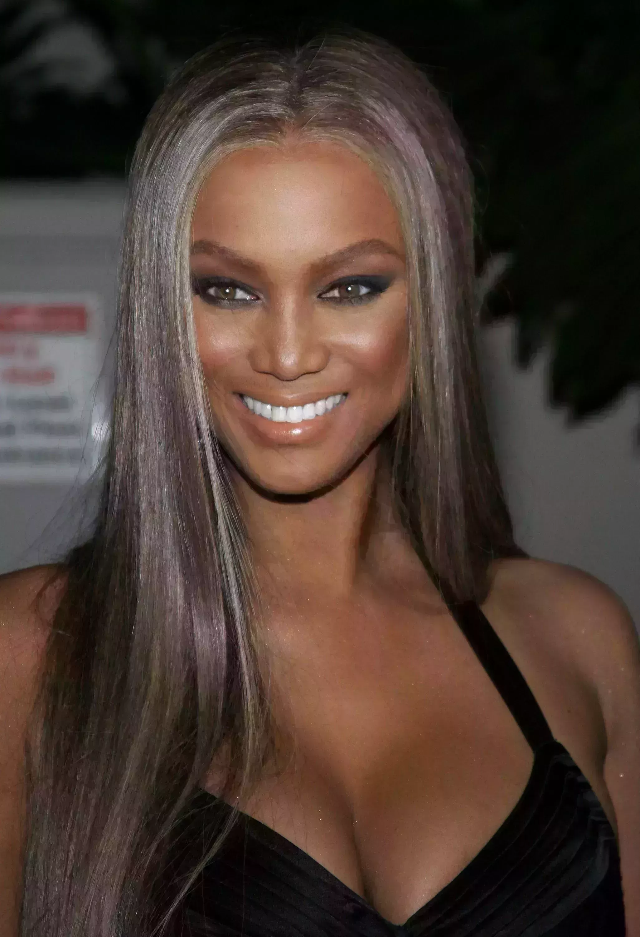 Tyra Banks’ Platinum Blonde Highlights on Black Hair