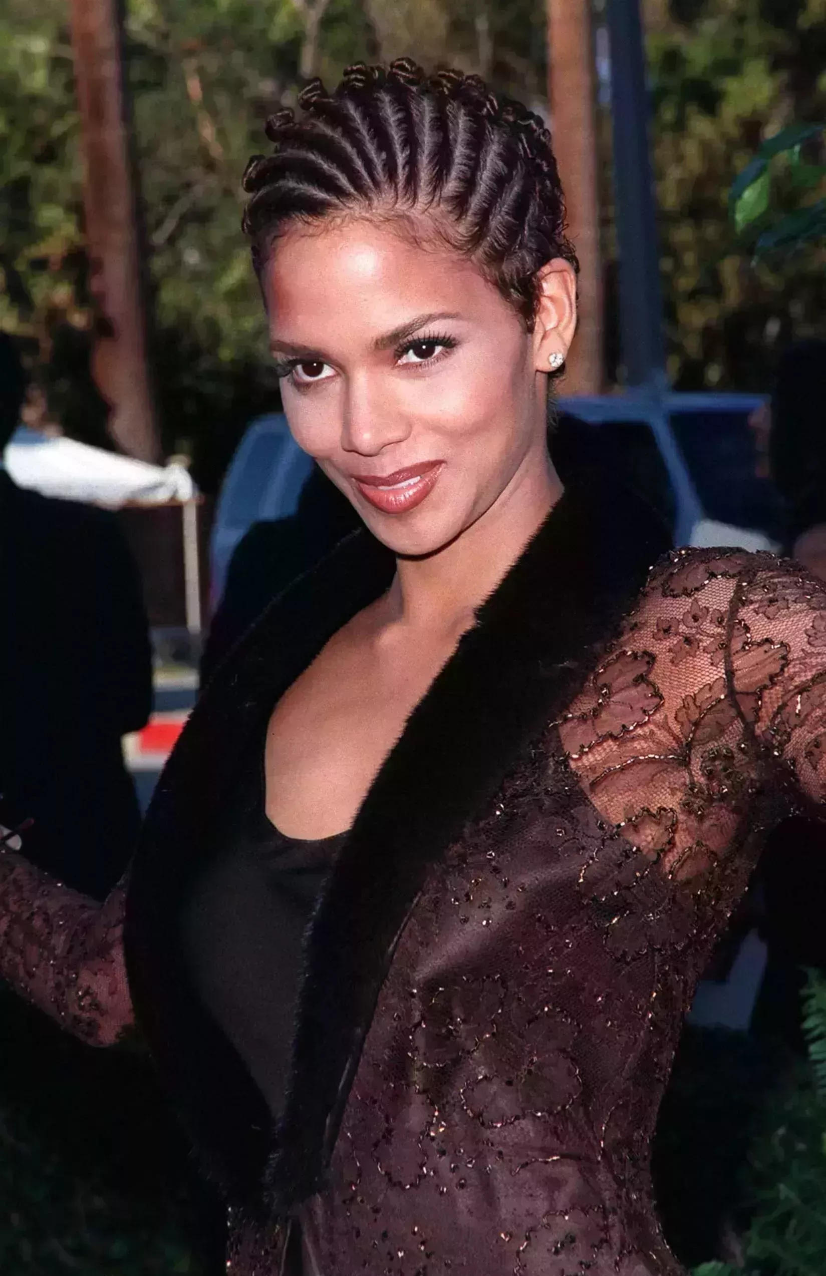 Halle Berry’s Asymmetrical Cornrows with Bantu Knots