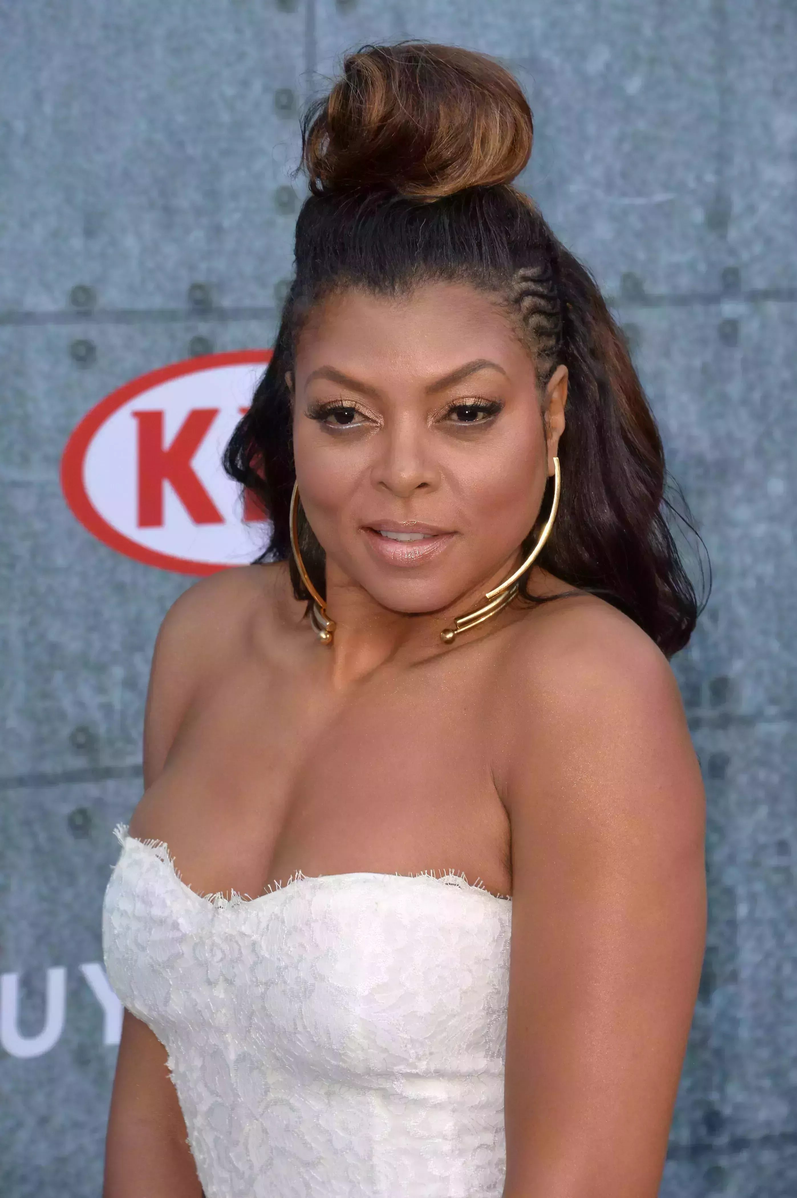 Taraji P. Henson’s Side Cornrows with Half-Up Bun