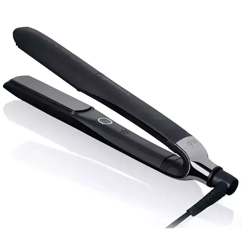 A black ghd Platinum+ Styler flat iron on a white background