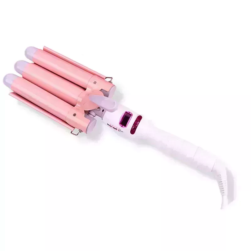 The pink Insert Name Here Insert Waves Here hair waver tool on a white background