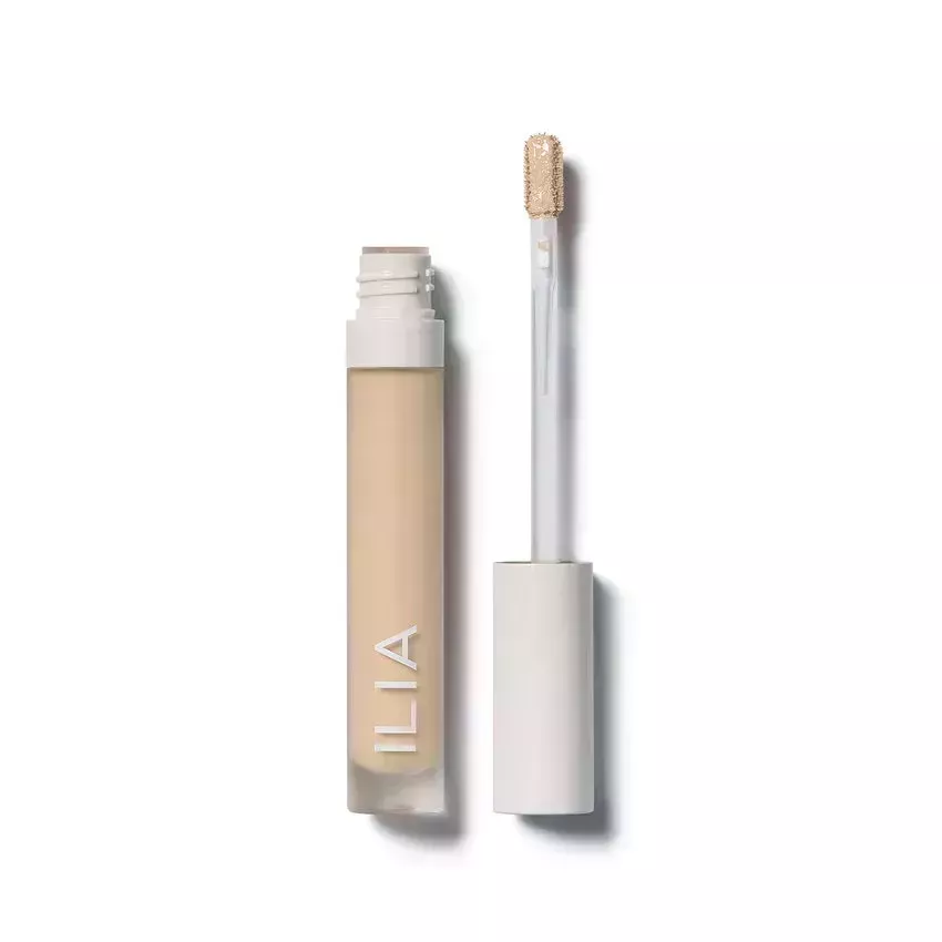 Ilia True Skin Serum Concealer tube of concealer with white wand and cap on white background