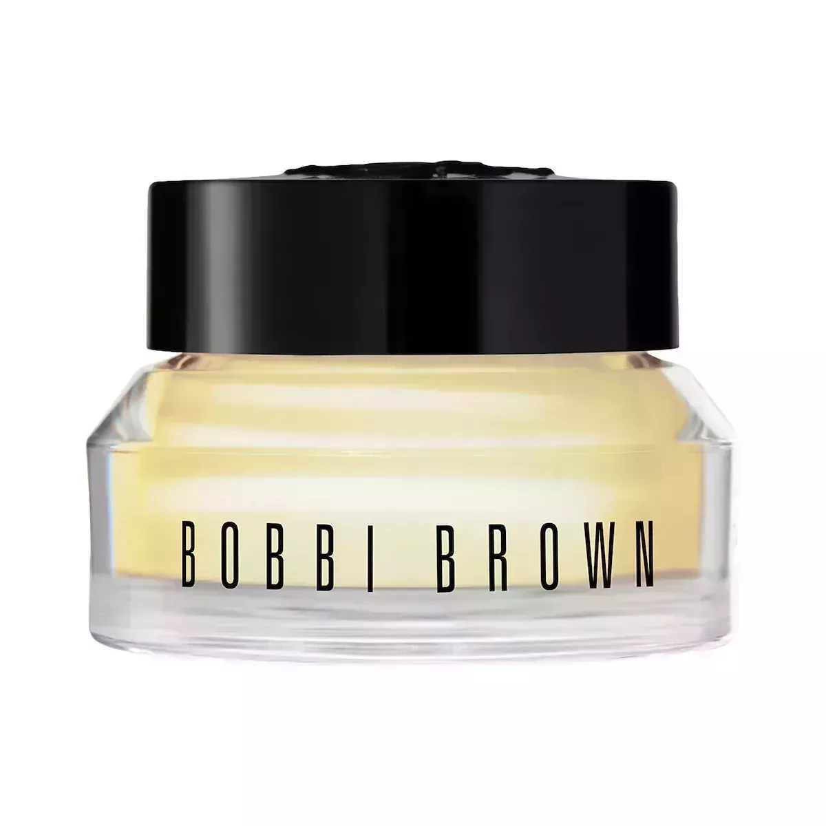 Bobbi Brown Face Base Eye Cream clear jar of yellow eye cream with black lid on white background