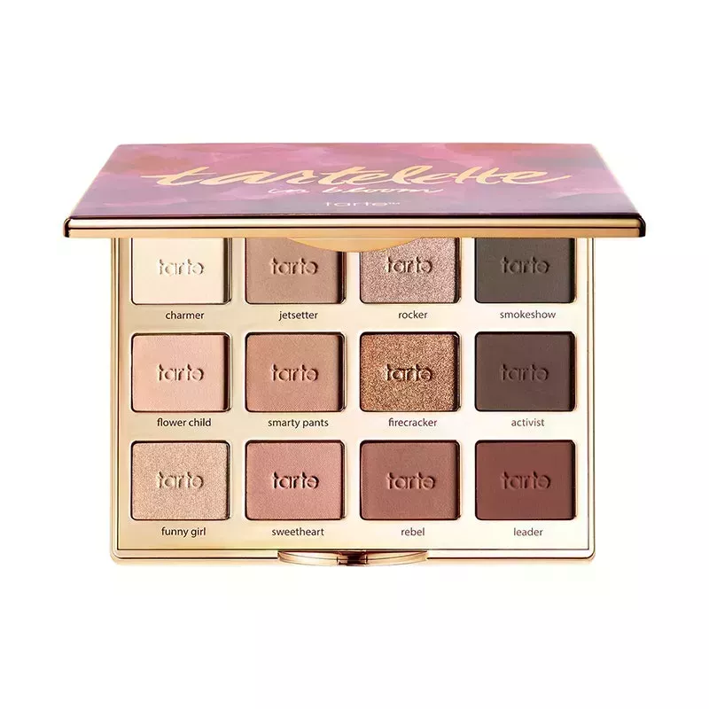 The 12-pan Tarte Tartelette In Bloom Amazonian Clay Palette filled with earth-toned eye shadows on a white background