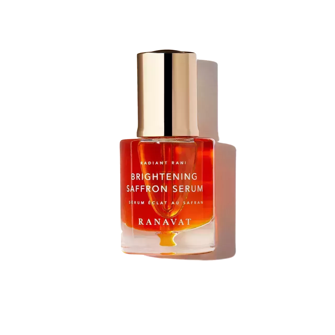 orange serum bottle on white background