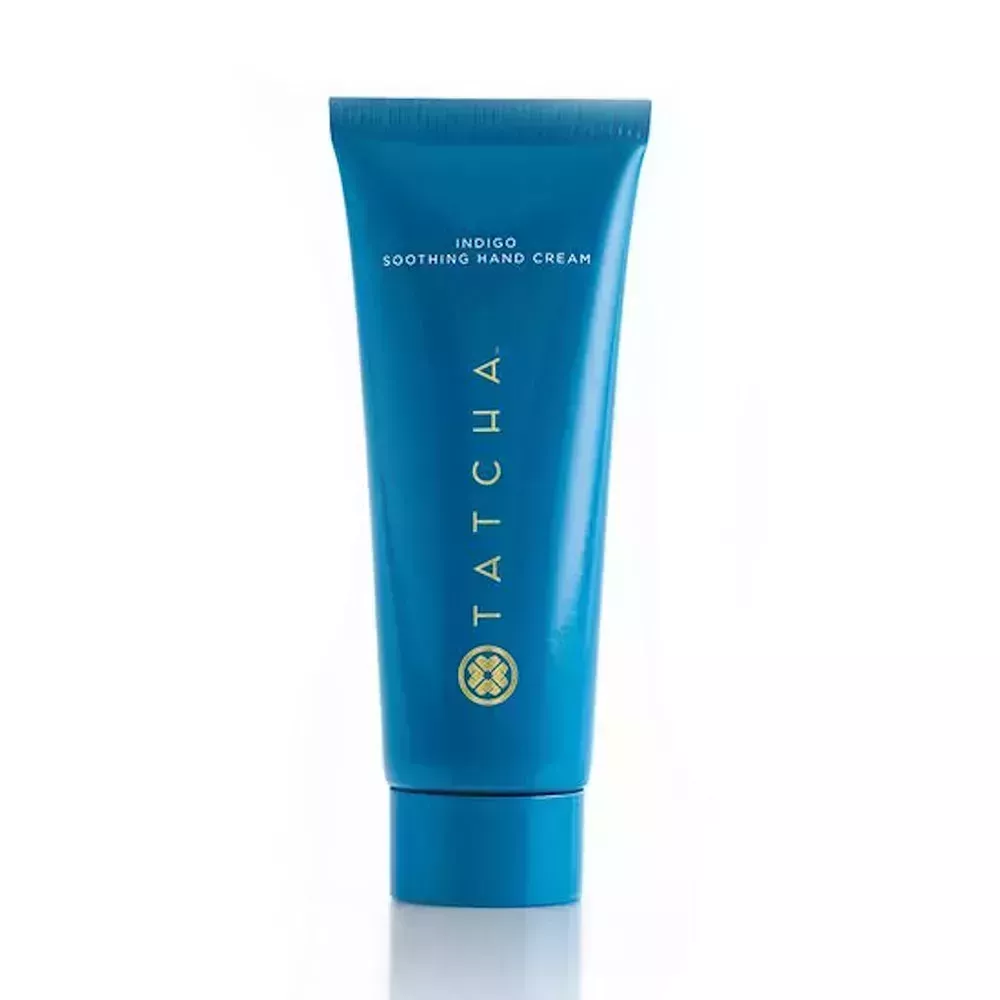 Tatcha Indigo Soothing Hand Cream in blue tube on white background