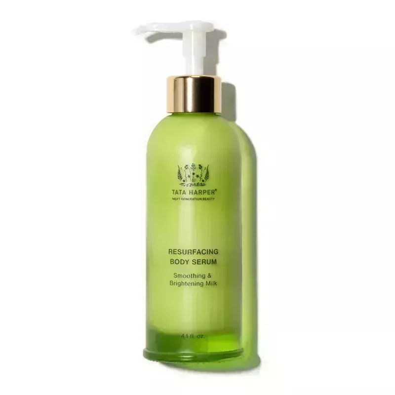 Tata Harper Skincare Resurfacing Body Serum: a green glass pump bottle with dark green text on a white background