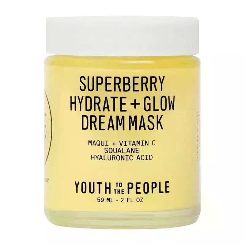 Youth to the People Superberry Hydrate and Glow Dream Mask: A glass jar filled with a yellow face mask on a white background