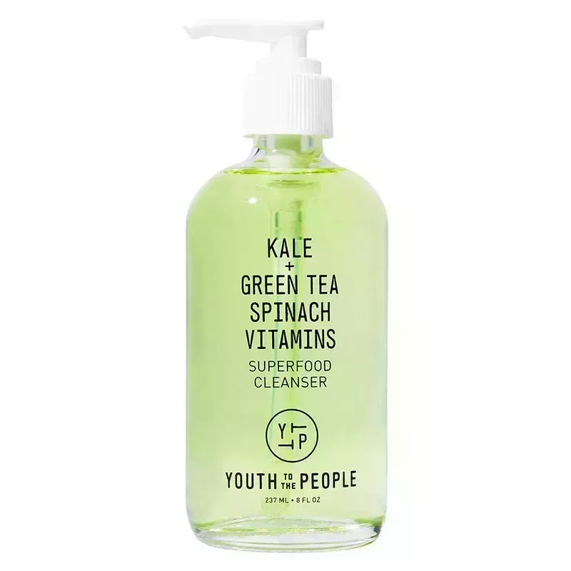 Youth to the People Superfood Cleanser: A glass pump bottle filled with green face wash on a white background