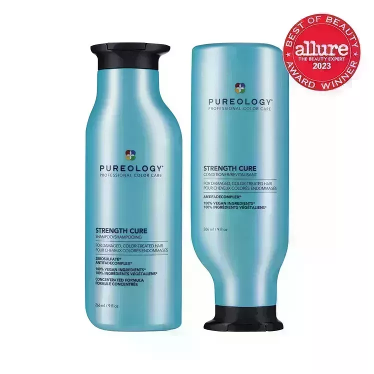 Pureology Strength Cure Sulfate Free Shampoo & Conditioner two blue bottles of champú and conditioner with black caps on white background with red Allure BoB seal in the top right corner