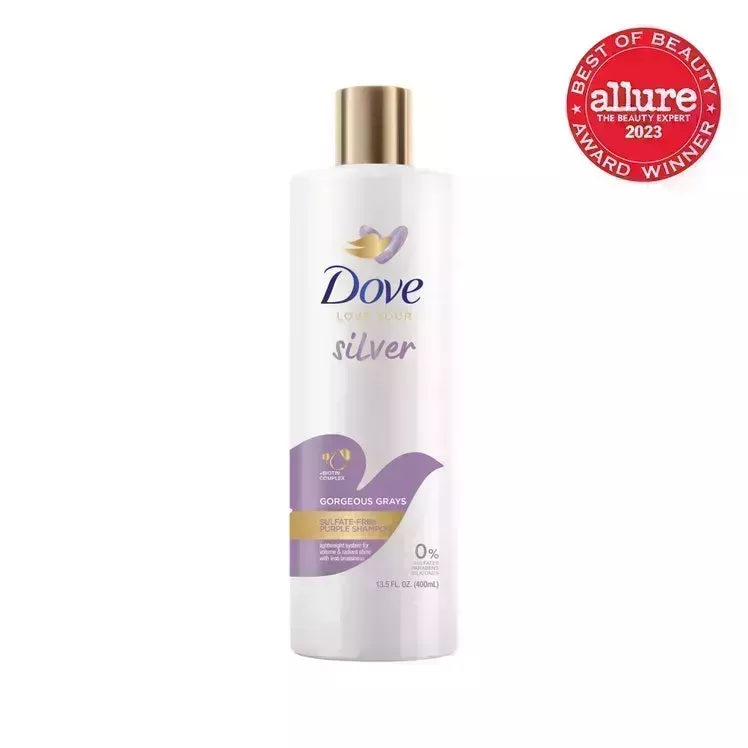 Dove Love Your Silver Gorgeous Grays Sulfate-Free Purple Shampoo white bottle with purple and gold dove illustration and gold cap on white background with red Allure BoB seal in the top right corner