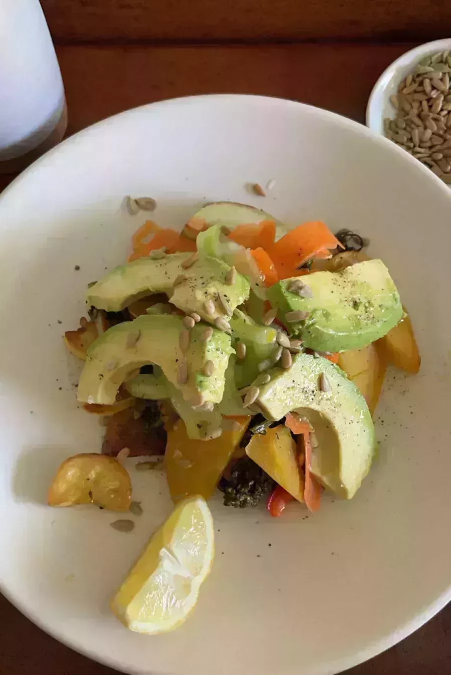 kourtney kardashian summer salad on plate in bed